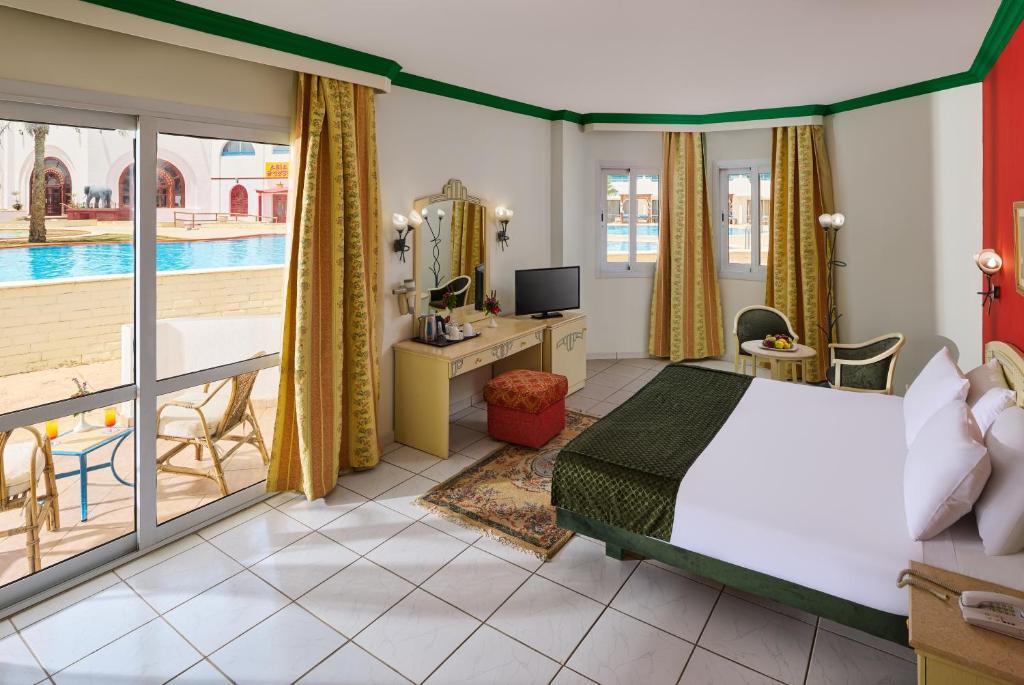 Postel nebo postele na pokoji v ubytování Dreams Vacation Resort - Sharm El Sheikh