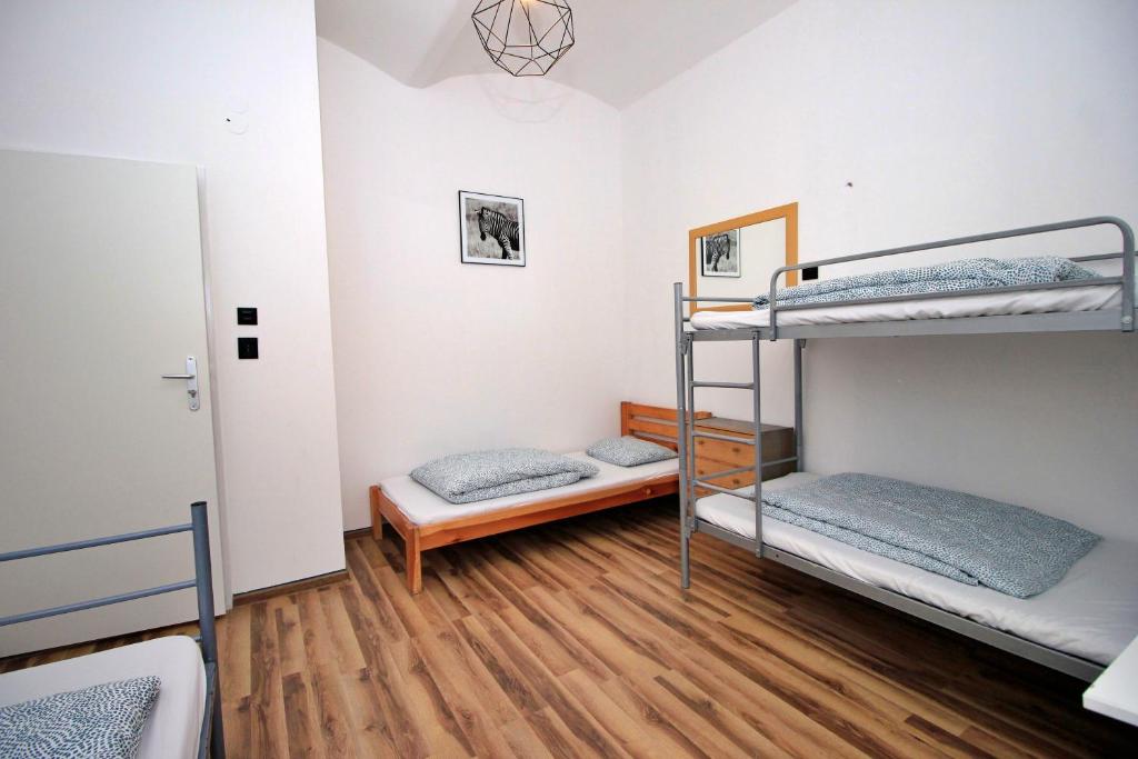 Posteľ alebo postele v izbe v ubytovaní Hostel Cinnamon