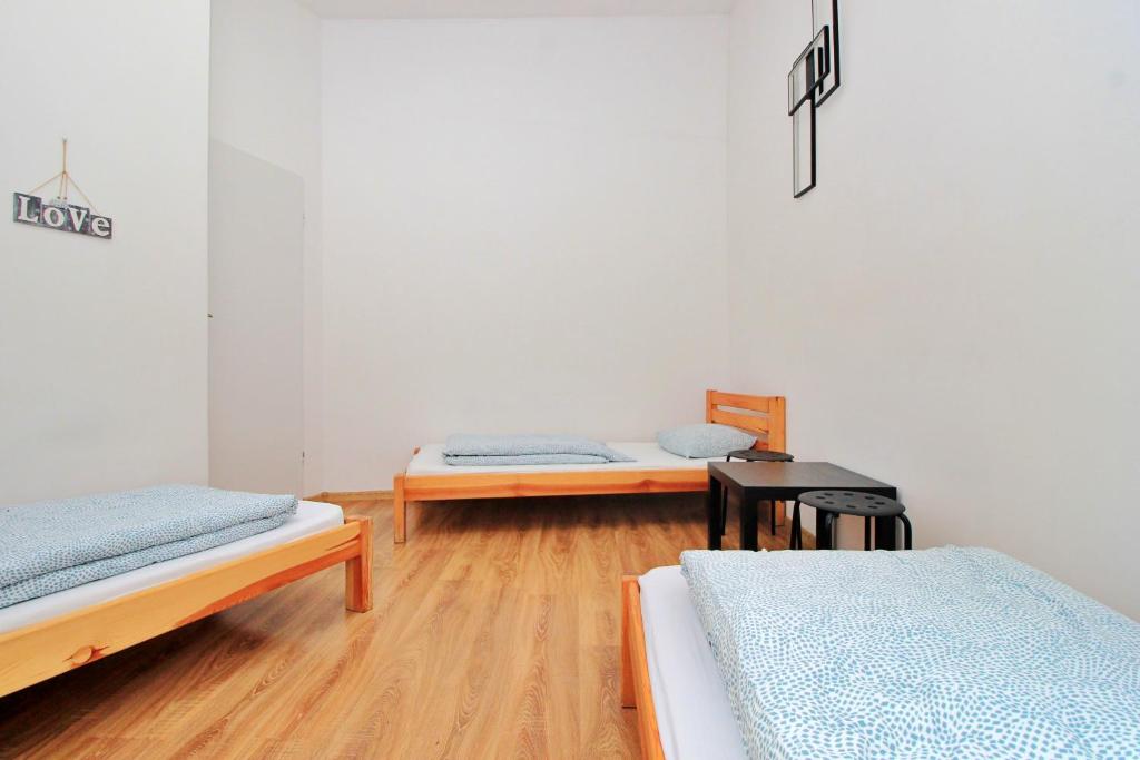 Posteľ alebo postele v izbe v ubytovaní Hostel Cinnamon