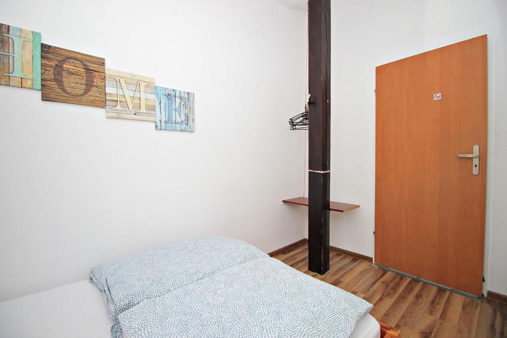 Posteľ alebo postele v izbe v ubytovaní Hostel Cinnamon