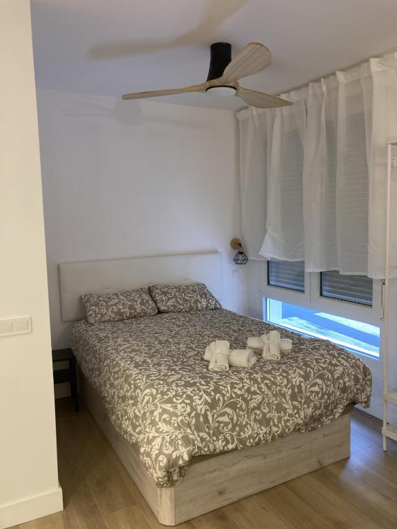 A bed or beds in a room at Bravo Murillo Apartments