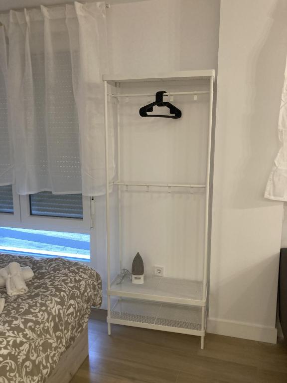 A bed or beds in a room at Bravo Murillo Apartments