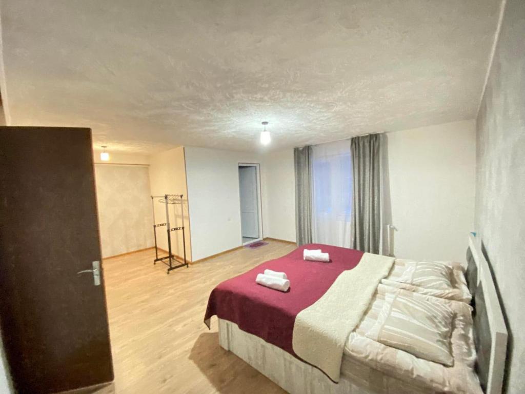Postel nebo postele na pokoji v ubytování Katos Guesthouse Mestia