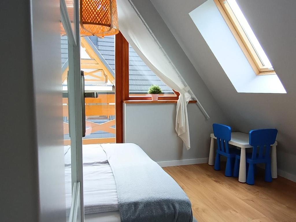 Posteľ alebo postele v izbe v ubytovaní TWOJA CHATA Apartamenty pod niebem zarezerwuj na podhalami pl