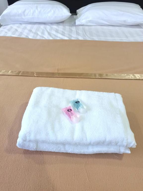 Postel nebo postele na pokoji v ubytování Shangg INN