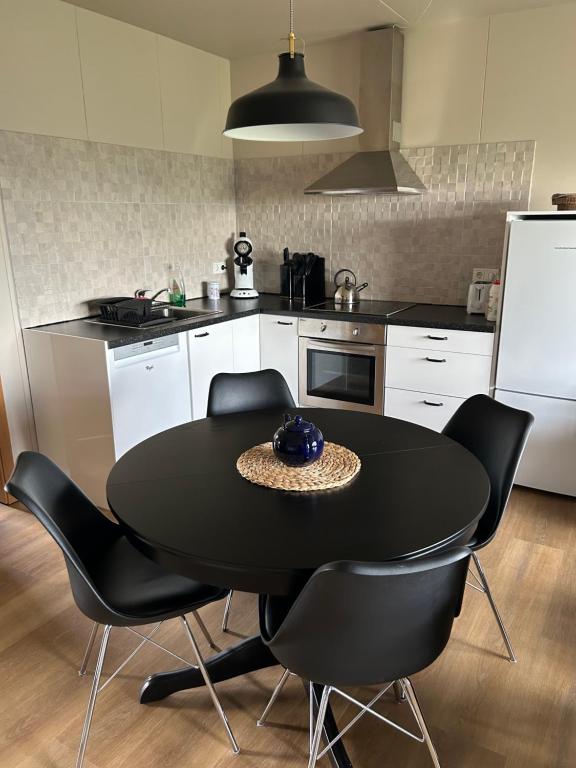 Kuchyň nebo kuchyňský kout v ubytování Bjarkarholt Guesthouse