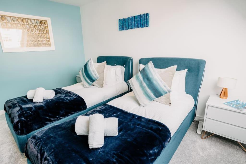 Postel nebo postele na pokoji v ubytování 3 Bedroom Holiday Home by beach in Newquay