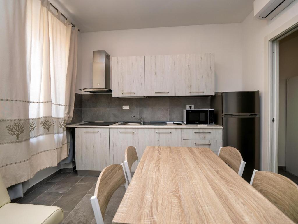Kuchnia lub aneks kuchenny w obiekcie Iside Accommodations