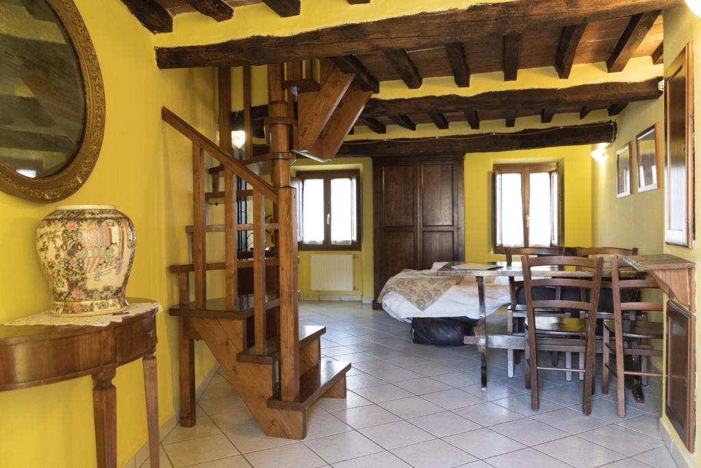 Postel nebo postele na pokoji v ubytování Borgo Giusto Tuscany