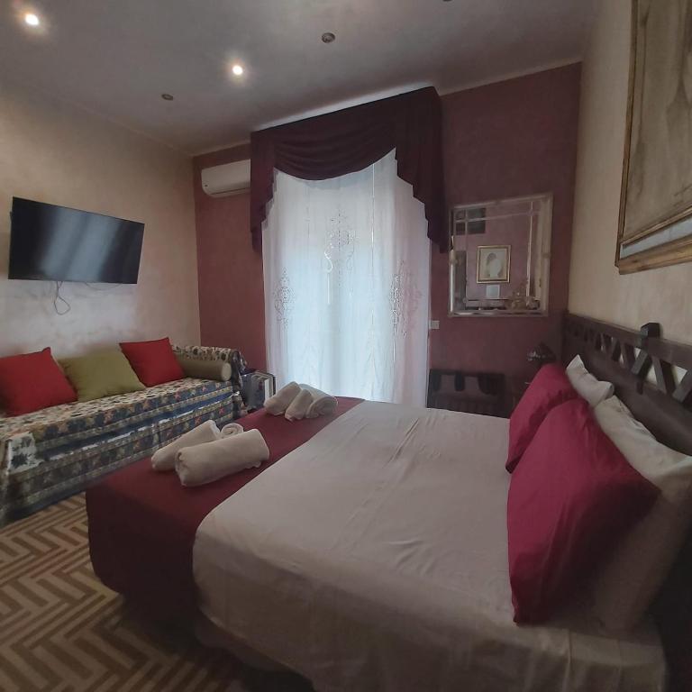 Postel nebo postele na pokoji v ubytování Bed and Breakfast Dolce Noemi