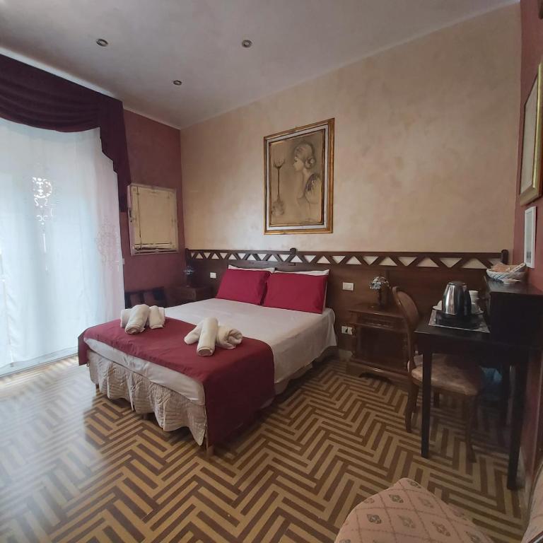 Postel nebo postele na pokoji v ubytování Bed and Breakfast Dolce Noemi