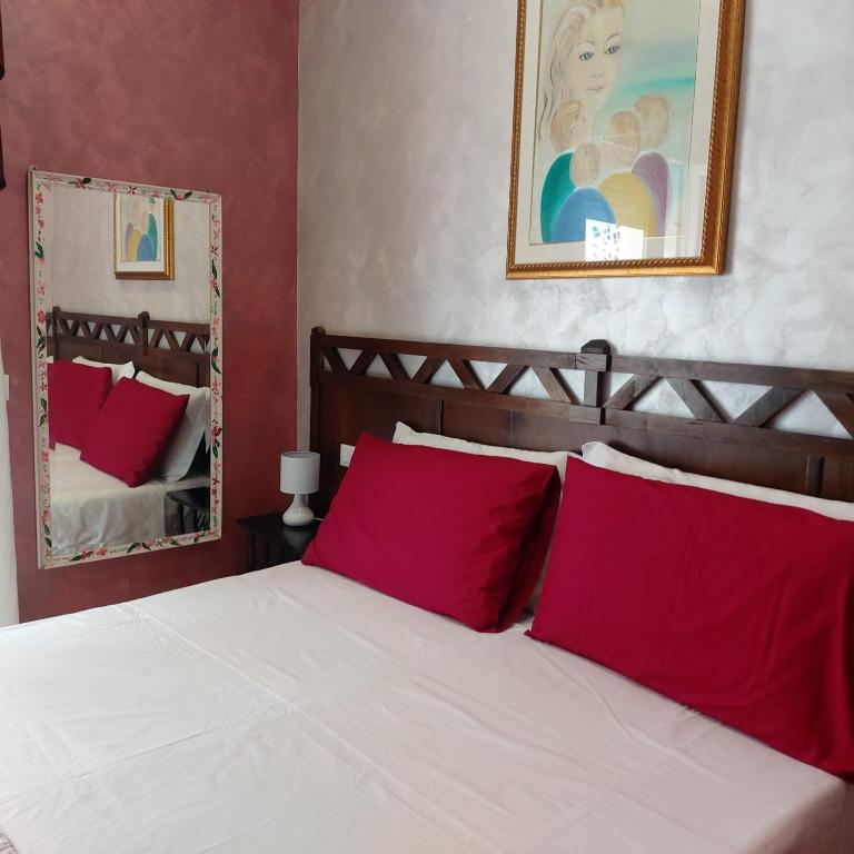 Postel nebo postele na pokoji v ubytování Bed and Breakfast Dolce Noemi