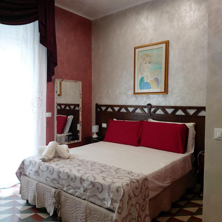 Postel nebo postele na pokoji v ubytování Bed and Breakfast Dolce Noemi