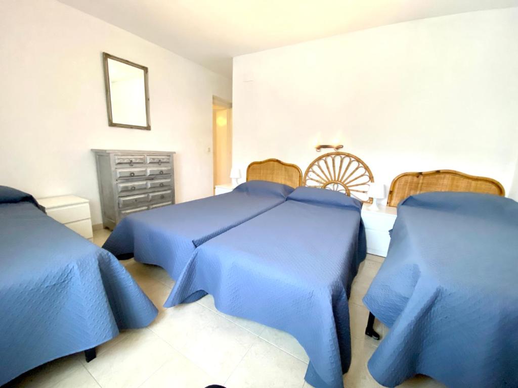 A bed or beds in a room at La Casita