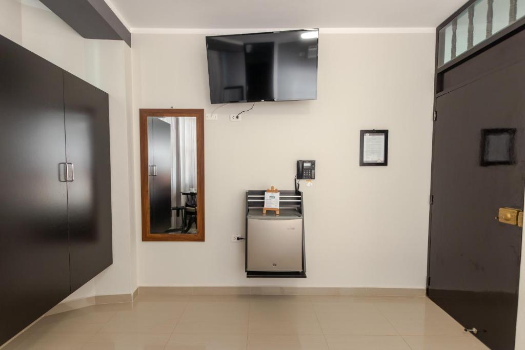 Kuchyň nebo kuchyňský kout v ubytování GOYA HOTEL