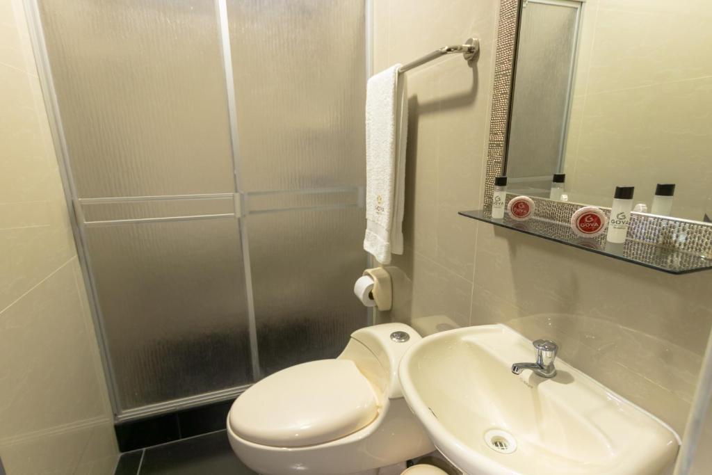Koupelna v ubytování GOYA HOTEL