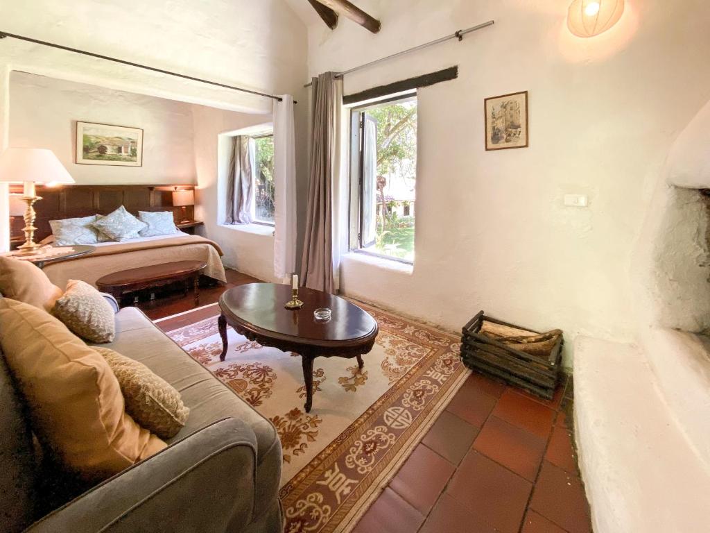 Postel nebo postele na pokoji v ubytování Hotel Hacienda Baza
