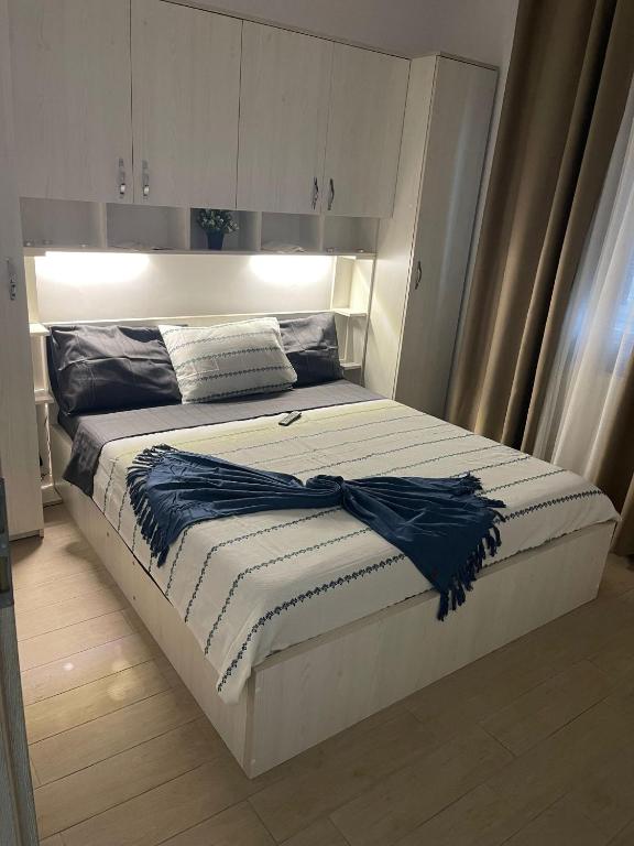 Llit o llits en una habitació de HOME NAS Bragadiru