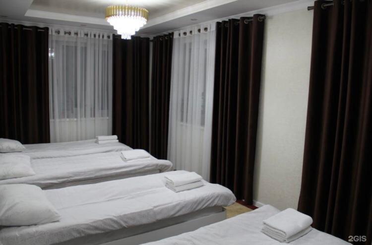Postel nebo postele na pokoji v ubytování Guest House Semetei
