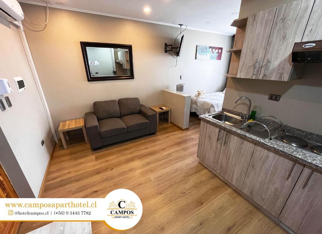 Kuchyň nebo kuchyňský kout v ubytování Apart Hotel Campos Rancagua