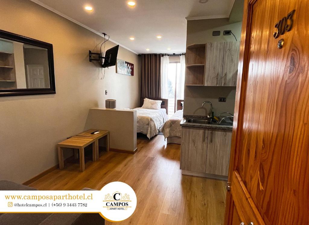 Postel nebo postele na pokoji v ubytování Apart Hotel Campos Rancagua
