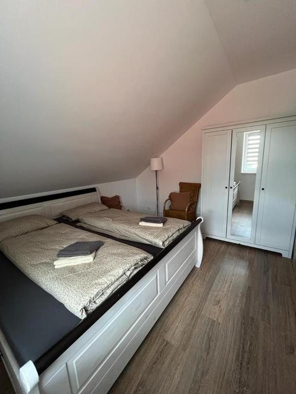 Postel nebo postele na pokoji v ubytování Apartmány Tobias