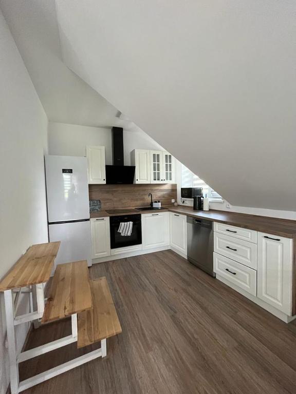 Kuchyň nebo kuchyňský kout v ubytování Apartmány Tobias