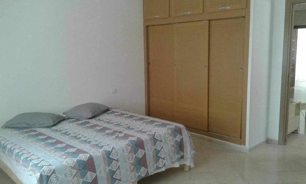 Postel nebo postele na pokoji v ubytování Route de la plage