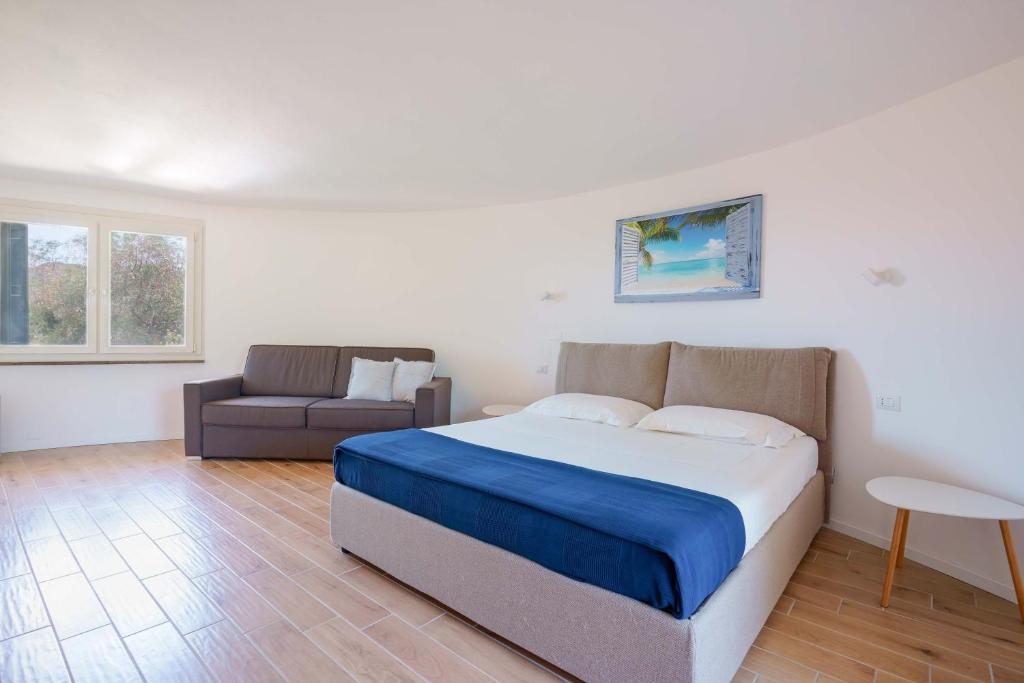 Łóżko lub łóżka w pokoju w obiekcie B&B Villa Zola