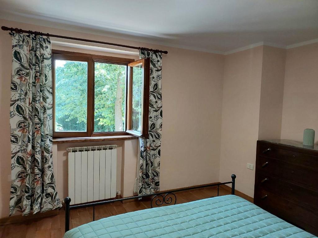 Postel nebo postele na pokoji v ubytování Nido Romantico