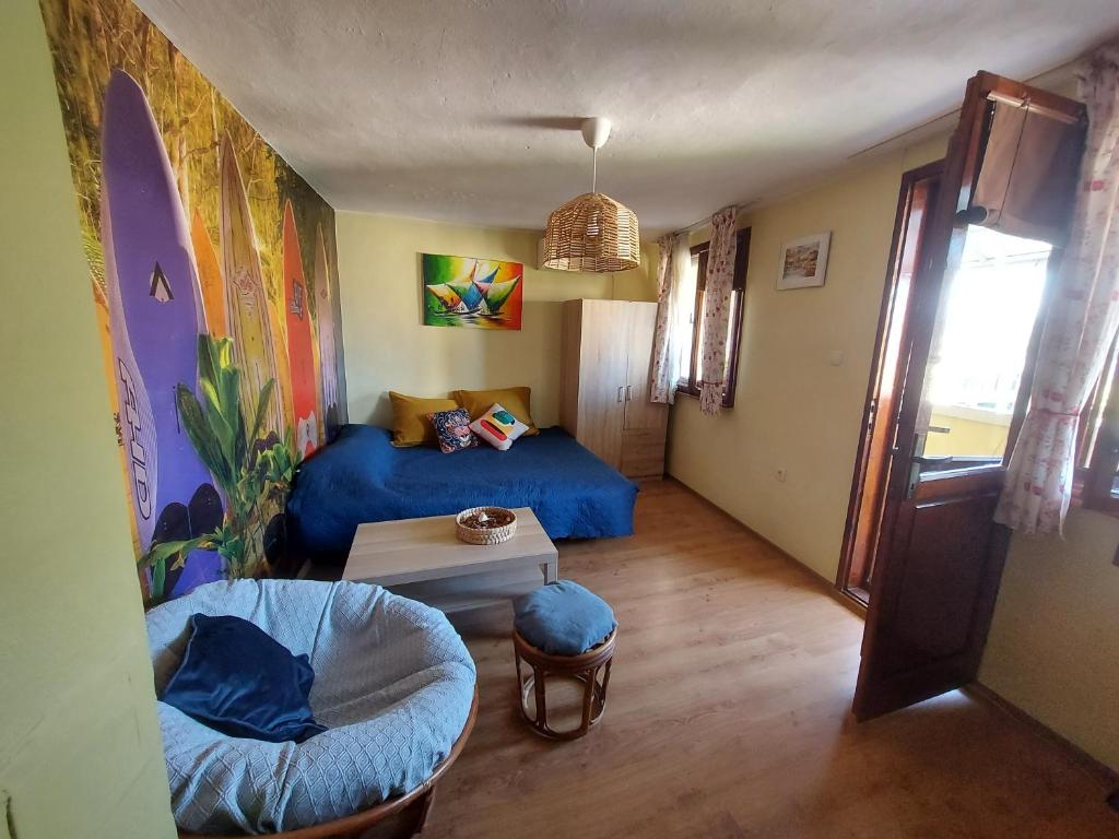 Ένα ή περισσότερα κρεβάτια σε δωμάτιο στο Surf house