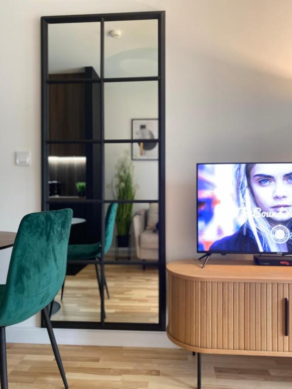 TV a/nebo společenská místnost v ubytování Seaside Shellter Rogowo