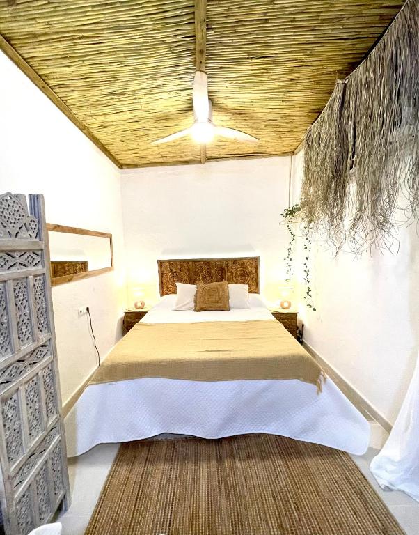 Postel nebo postele na pokoji v ubytování Arcos de Tarifa, Casco historico