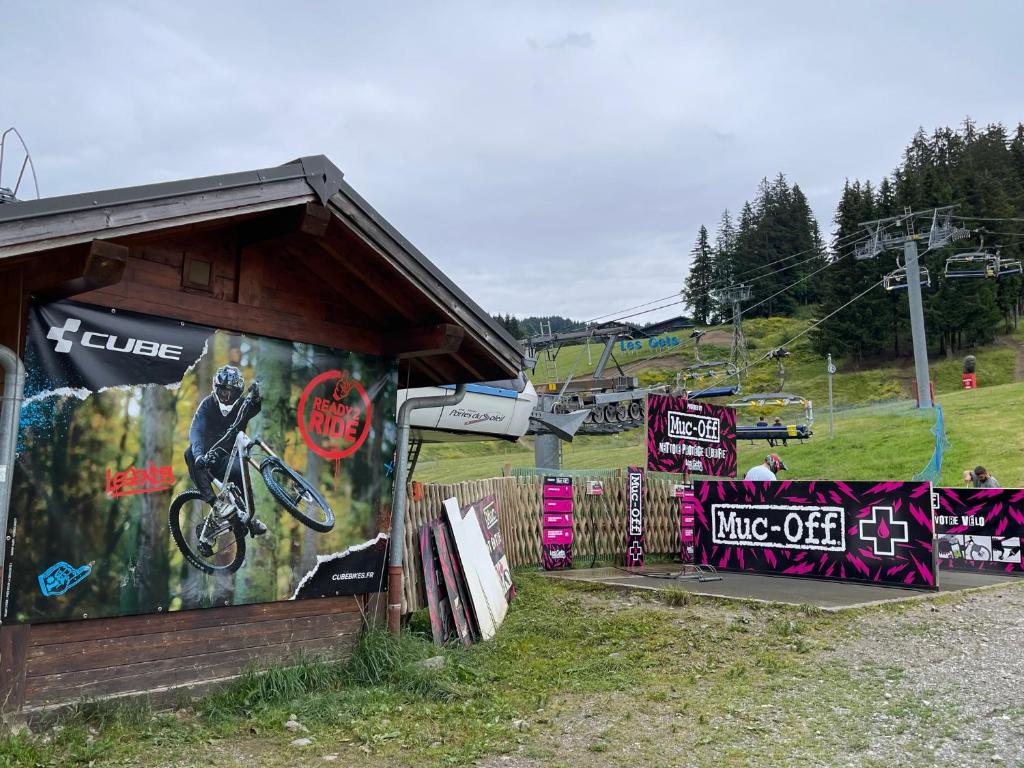 a building with signs on the side of it at GESPERE LE STELLA in Les Gets