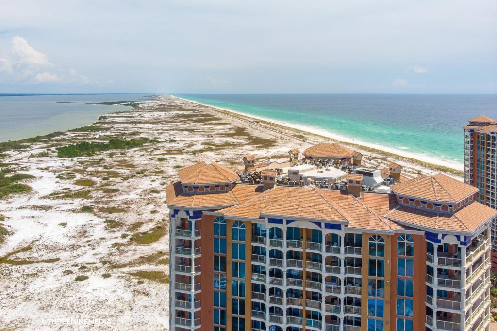 an aerial view of the resort and the beach at Amazing WATERVIEW in every room, PORTOFINO Island Resort condo in Pensacola Beach