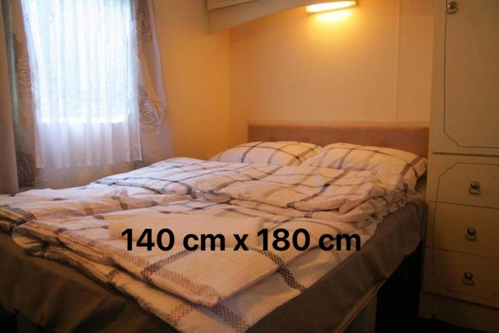 Posteľ alebo postele v izbe v ubytovaní Noclegi u Jagny