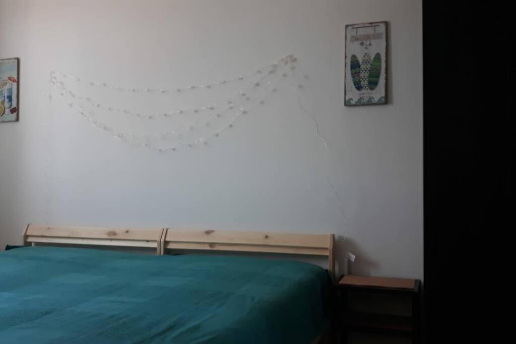 Postel nebo postele na pokoji v ubytování Ampio e luminoso attico nel cuore di Bisceglie