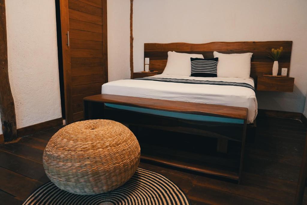 Postel nebo postele na pokoji v ubytování Bluebayou Bacalar