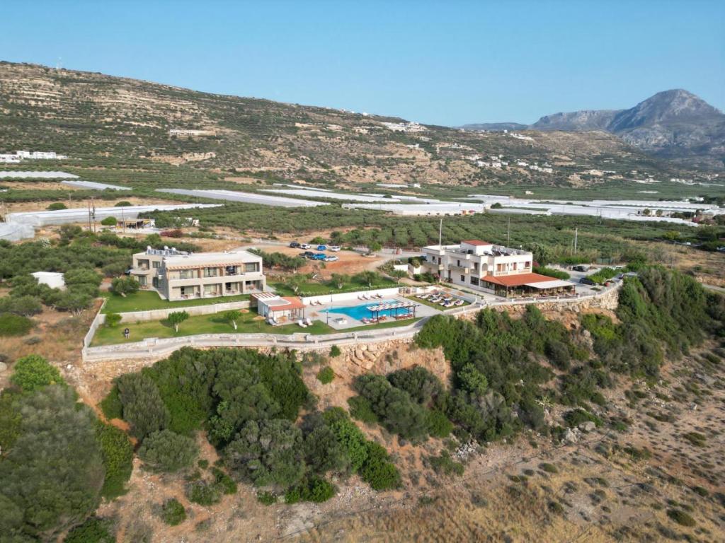 an aerial view of a building on a hill at Panorama Hotel in Falasarna