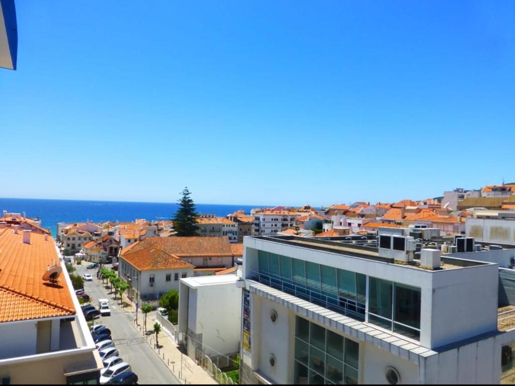 a view of a city from a building at Your Home near the beach - Sesimbra in Sesimbra