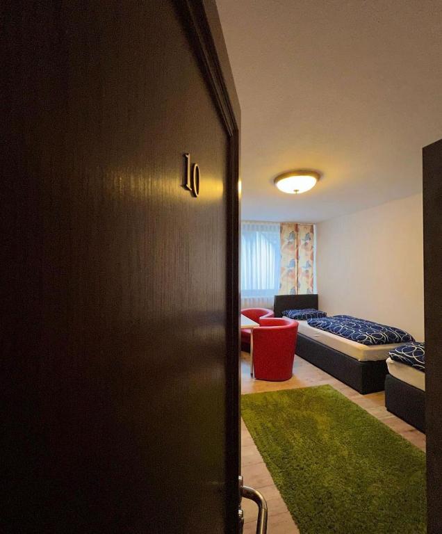 Postel nebo postele na pokoji v ubytování Hotel Gambrinus