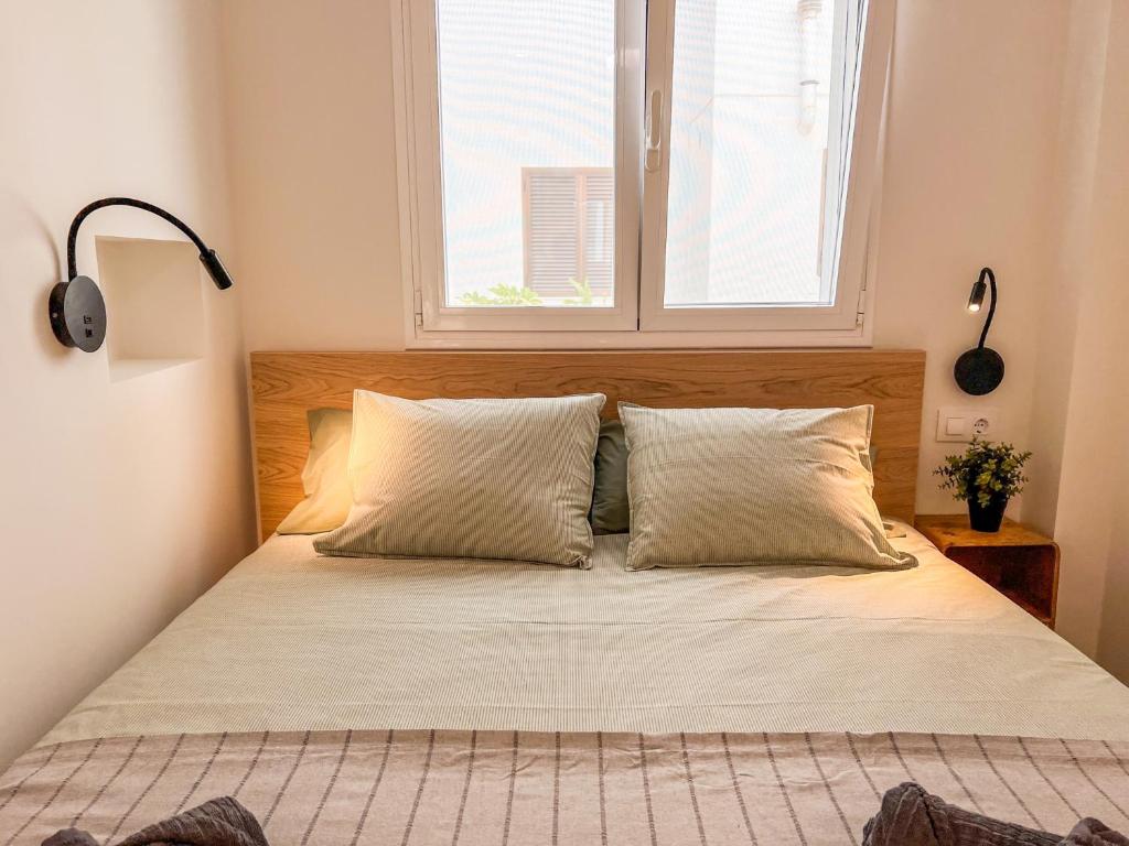 Postel nebo postele na pokoji v ubytování Tarifa Cozy House - Las Cañas I