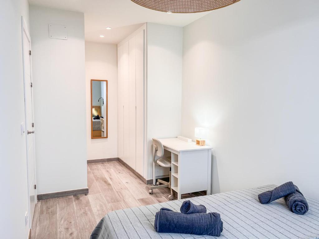 Postel nebo postele na pokoji v ubytování Tarifa Cozy House - Las Cañas I
