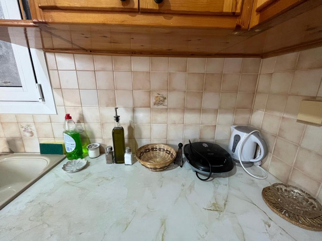 Kuchyň nebo kuchyňský kout v ubytování Port House Apartment