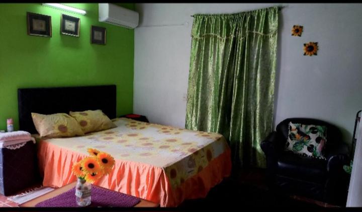 Postel nebo postele na pokoji v ubytování Hospedaje Luque