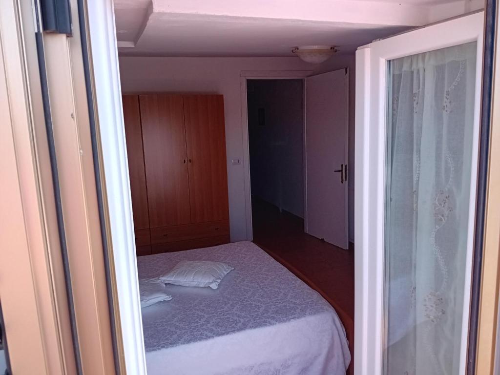 Postel nebo postele na pokoji v ubytování Appartamento Marina di Pisticci-Marconia