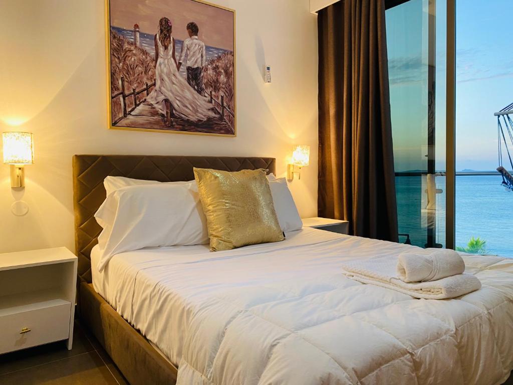 Postel nebo postele na pokoji v ubytování Fogo Boutique Hotel