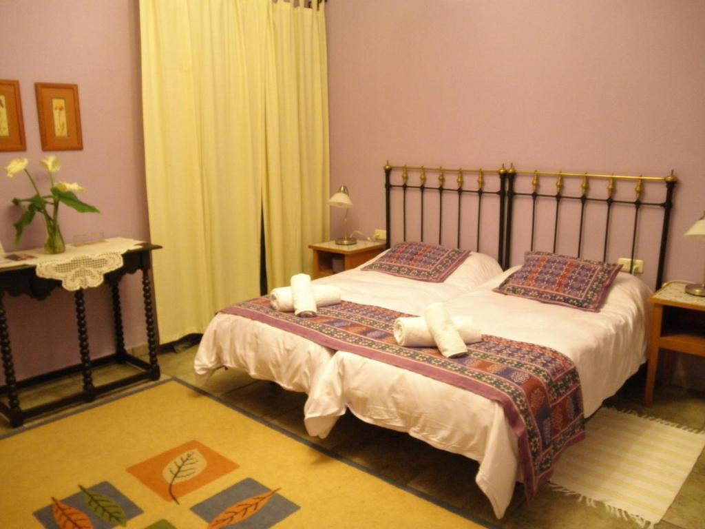 Cama o camas de una habitación en Casa Rural El Aguila