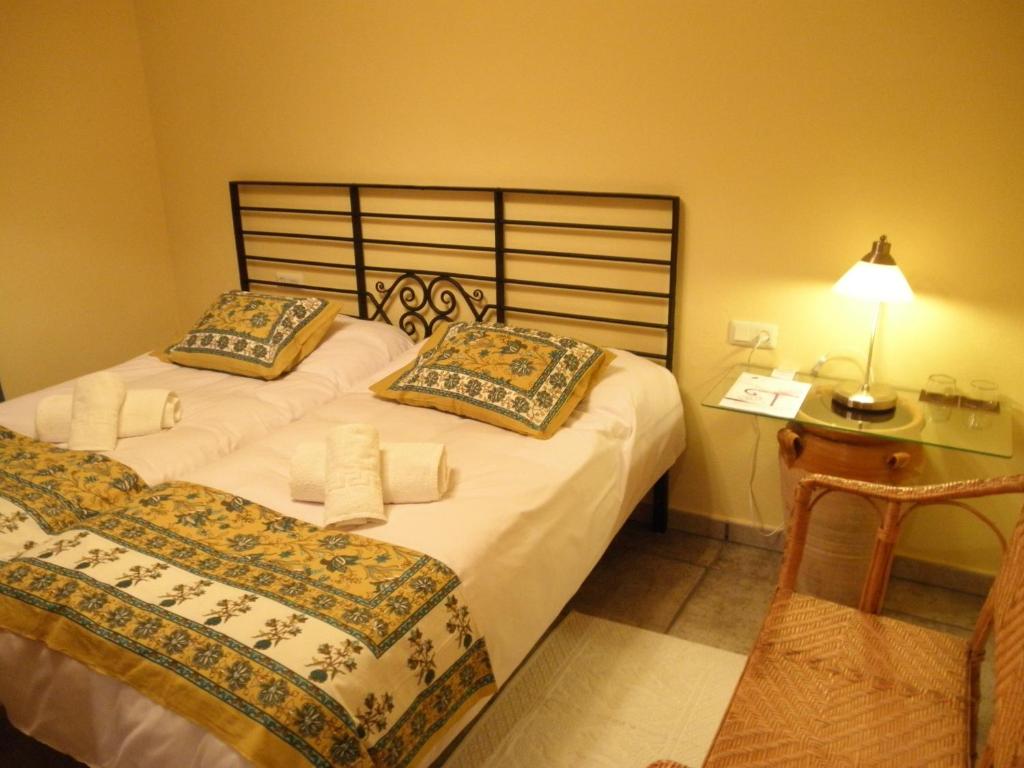 Cama o camas de una habitación en Casa Rural El Aguila