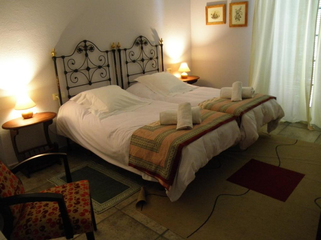 Cama o camas de una habitación en Casa Rural El Aguila